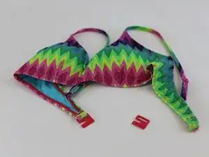 Eine Bikinischnalle austauschen