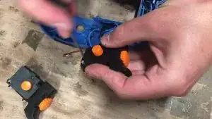 To release the other cables, slide them to the side out of the  way with a screwdriver to open the switch.