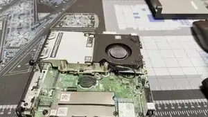 The fan can be removed by rotating it up and out as shown