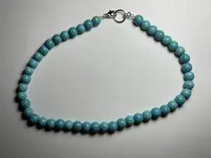 So repariert man eine Perlenkette