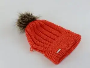 Einen losen Faden reparieren