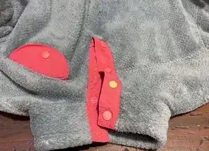 Snap the two halves of the snap together to make sure they're properly aligned and functional.